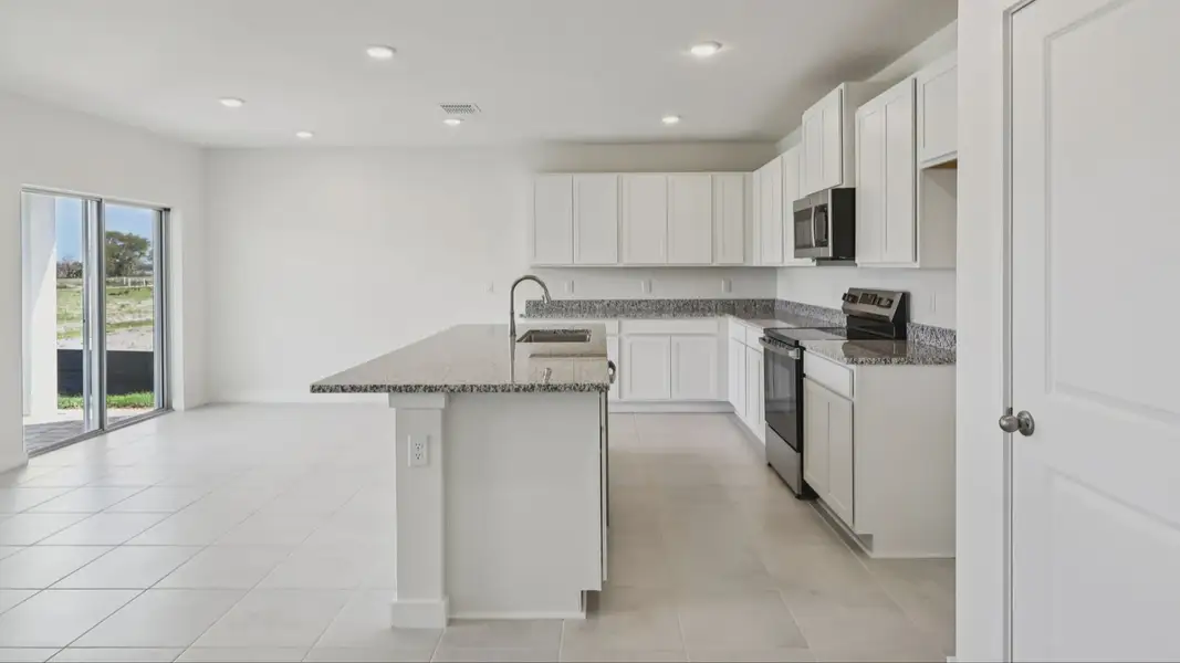 Furnished interior view inside a new home in Willowbrook North, Winter Haven (Image 10).