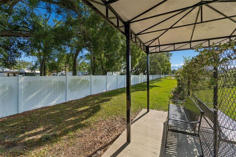 Exterior details and patio area of a home in , Land O' Lakes (Image 32).