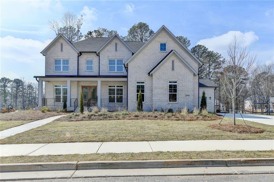 Front exterior of a new home in , Cumming, GA, highlighting curb appeal (Image 25).