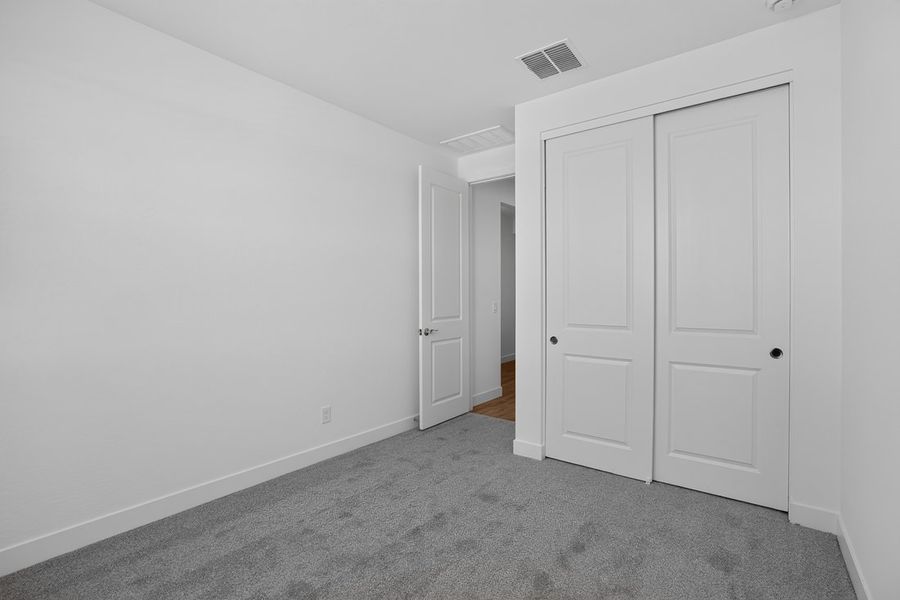 Spacious, unfurnished interior of a new home in Artisan at Asante, Surprise (Image 23).