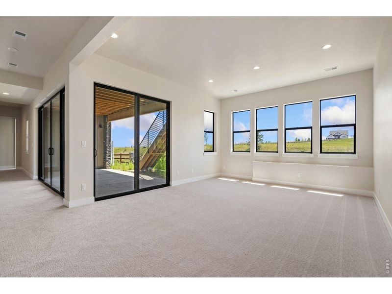 Spacious, unfurnished interior of a new home in The Fairways at RainDance, Windsor (Image 12).