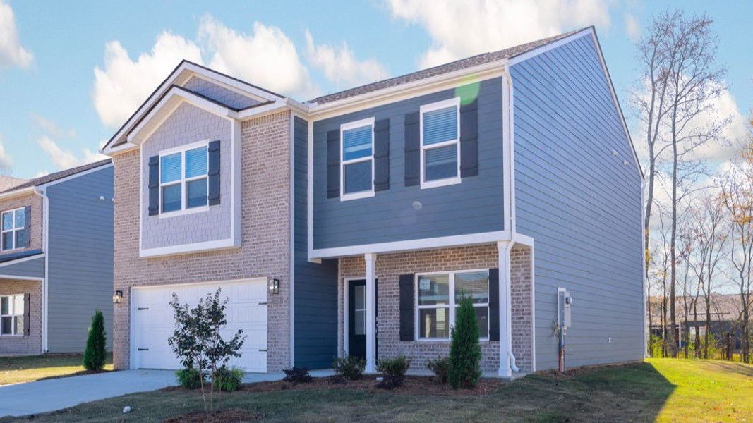 Front exterior of a new home in Fairview Hills, Cleveland, TN, highlighting curb appeal (Image 2).