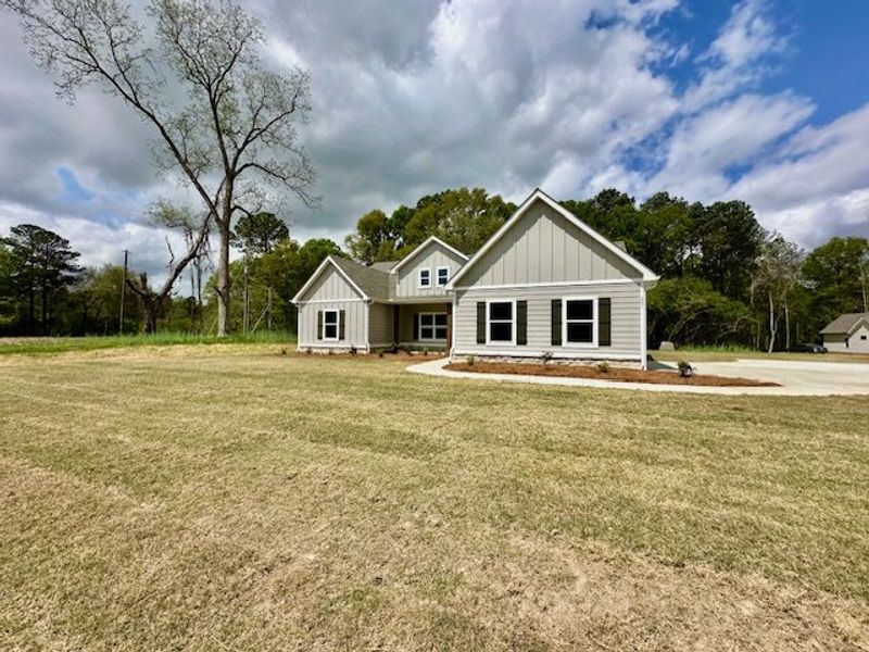 Front exterior of a new home in Lower Big Springs, LaGrange, GA, highlighting curb appeal (Image 2).