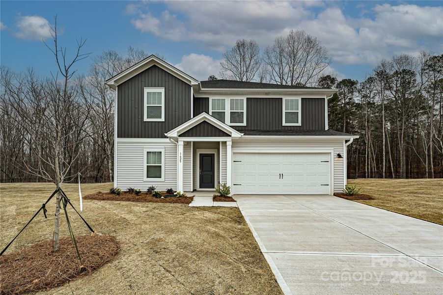 Front exterior of a new home in Buffalo Ridge, Newton, NC, highlighting curb appeal (Image 1).