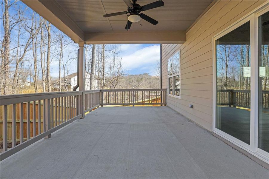 Exterior details and patio area of a home in Marble Tree, Ball Ground (Image 24).