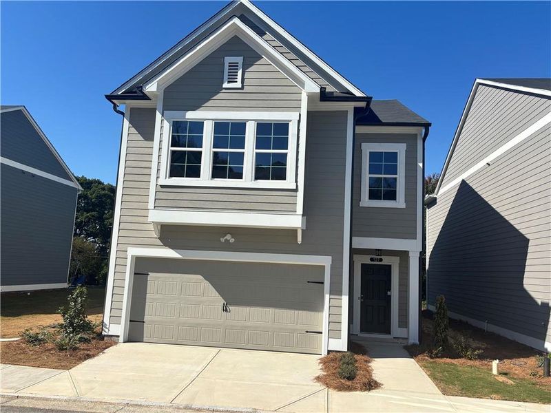 Front exterior of a new home in , Calhoun, GA, highlighting curb appeal (Image 2). Front exterior of a new home in , Calhoun, GA, highlighting curb appeal (Image 2).