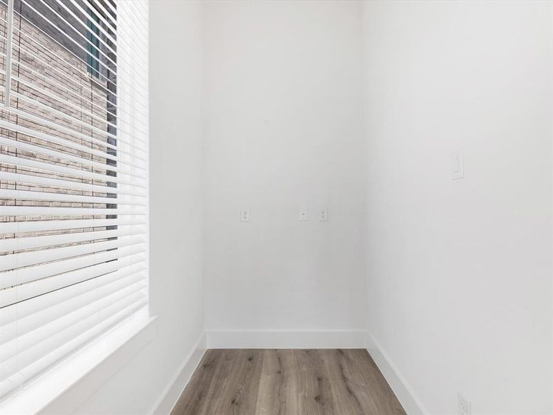 Spacious, unfurnished interior of a new home in Royal Court, Little Elm (Image 14).