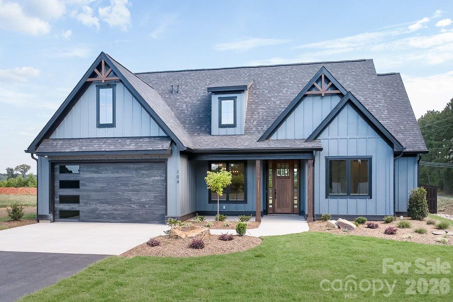 Front exterior of a new home in , Norwood, NC, highlighting curb appeal (Image 25). Front exterior of a new home in , Norwood, NC, highlighting curb appeal (Image 25).