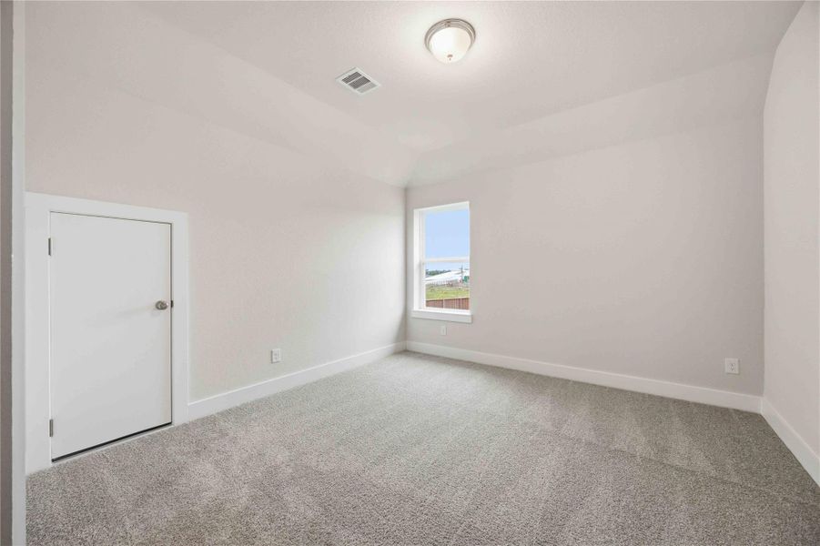 Spacious, unfurnished interior of a new home in Ellwood, Iowa Colony (Image 22).
