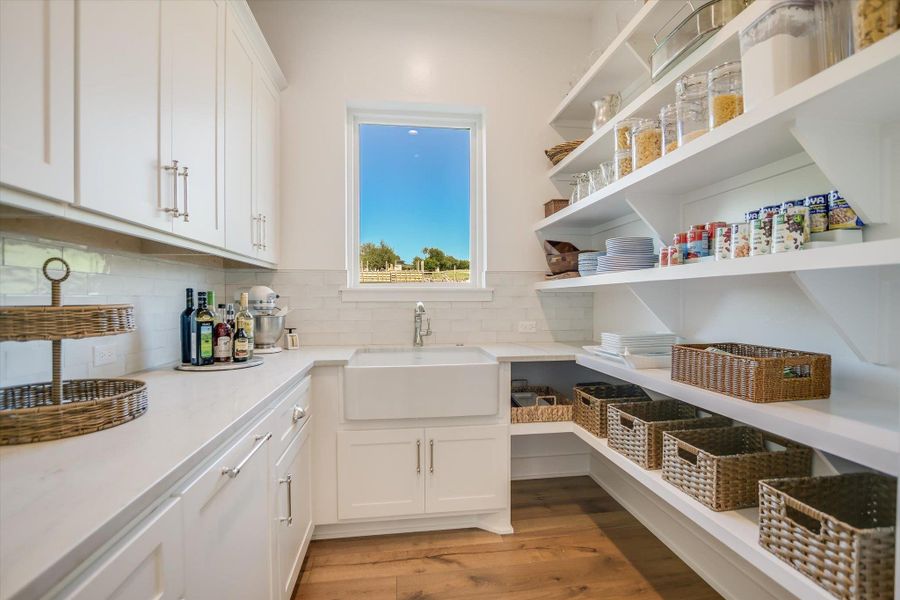Storage area featuring a sink Storage area featuring a sink