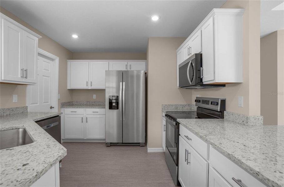 Furnished interior view inside a new home in , Floral City (Image 11).