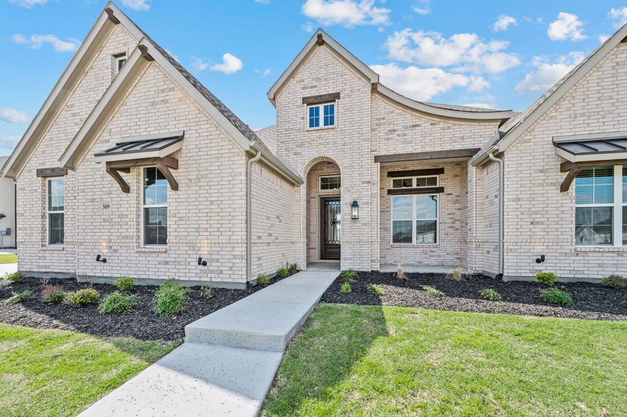 Front exterior of a new home in NorthGlen, Haslet, TX, highlighting curb appeal (Image 26).