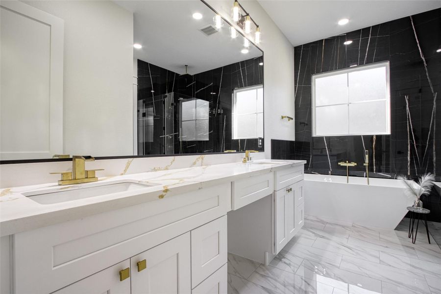 Primary bath features double sinks and large soaking tub Primary bath features double sinks and large soaking tub