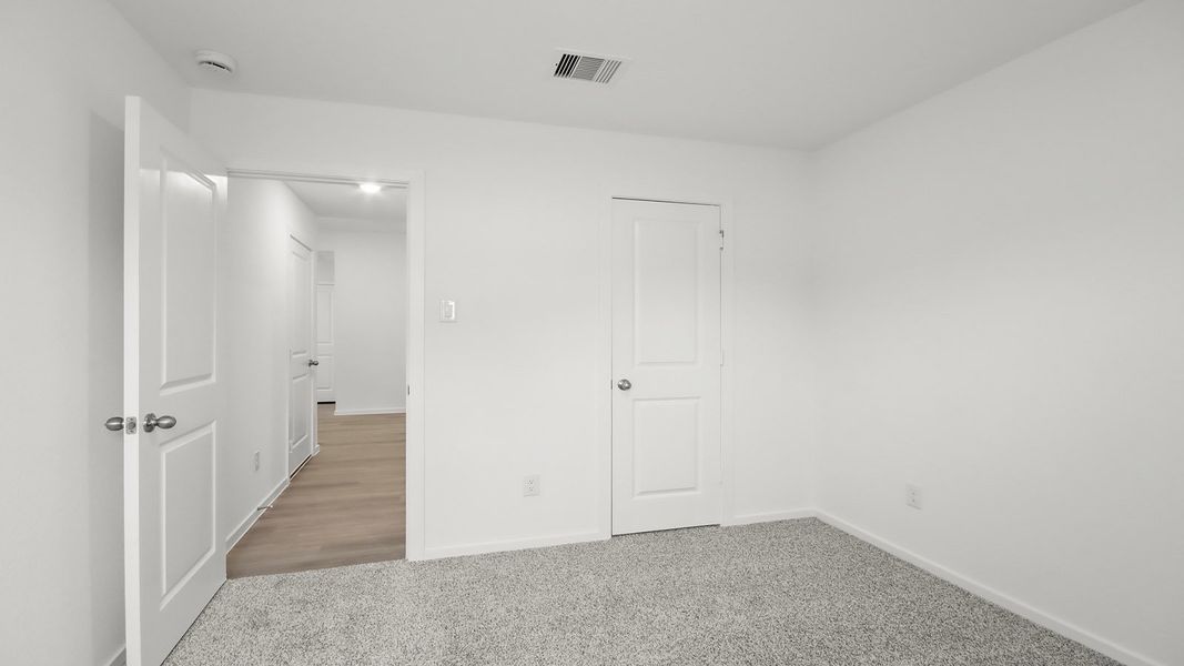 Representative unfurnished interior of a home built from the Huntsville by D.R. Horton in Mill Creek, Magnolia (Image 23).