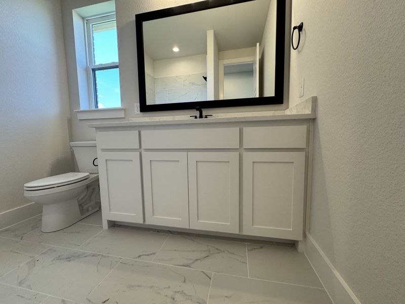 Furnished interior view inside a new home in Coyote Crossing, Godley (Image 6).