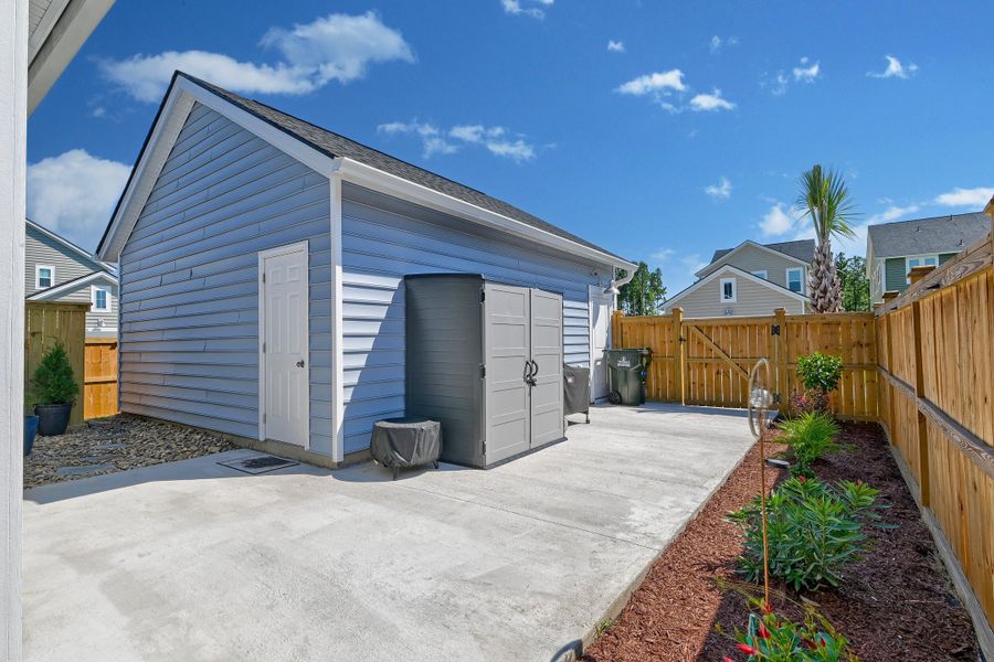 Exterior details and patio area of a home in Heron's Walk at Summers Corner, Summerville (Image 28).