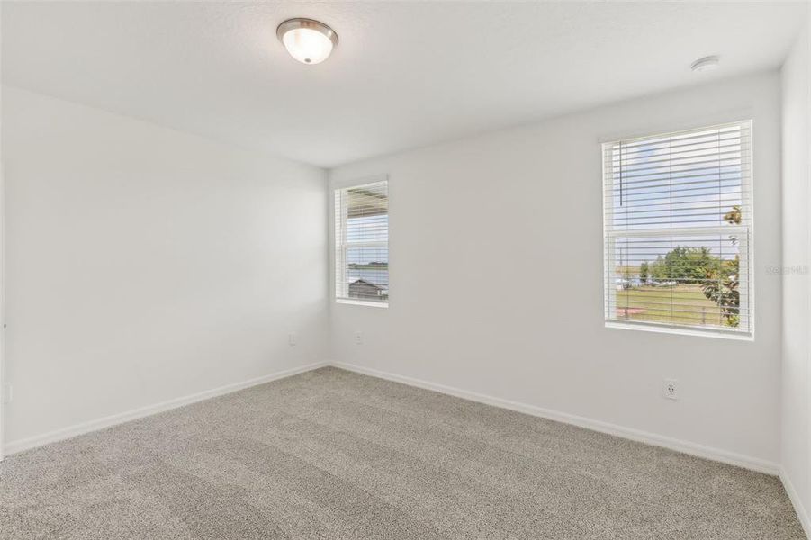 Spacious, unfurnished interior of a new home in Eden Hills, Lake Alfred (Image 26).