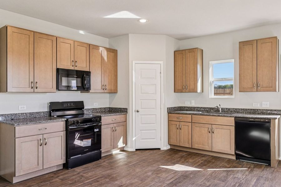 Representative furnished interior of a home built from the Hunters Ranch 1468 by Brohn Homes in Hunters Ranch, San Antonio (Image 4).