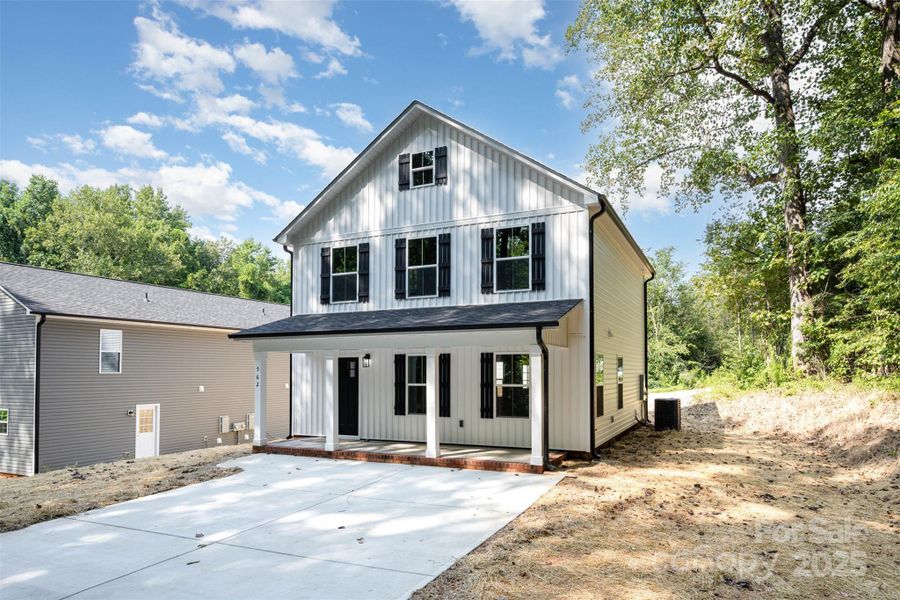 Front exterior of a new home in , Kannapolis, NC, highlighting curb appeal (Image 17).