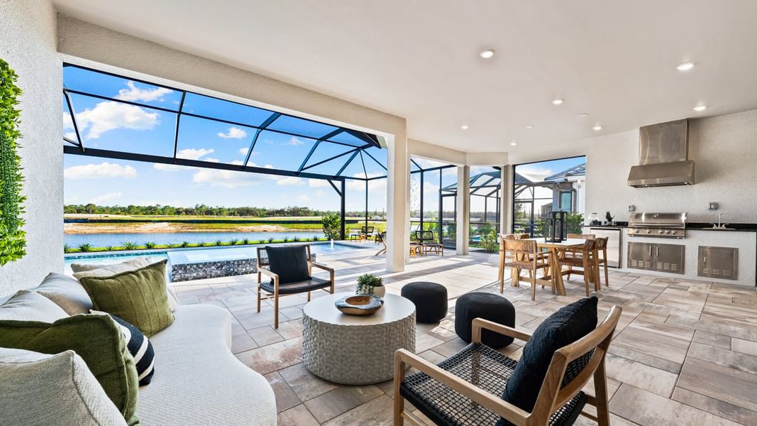 Exterior details and patio area of a home in Esplanade Lake Club, Fort Myers (Image 2).