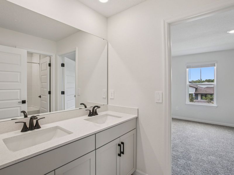 Furnished interior view inside a new home in The Grove at Stuart Crossing - Signature Series, Bartow (Image 7).