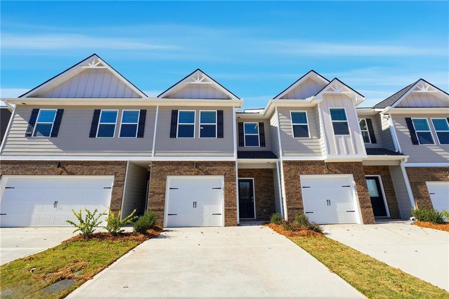 Front exterior of a new home in Carolina, Palmetto, GA, highlighting curb appeal (Image 1). Front exterior of a new home in Carolina, Palmetto, GA, highlighting curb appeal (Image 1).