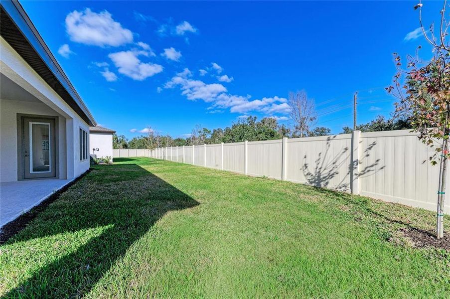 Exterior details and patio area of a home in Crosswind Point, Parrish (Image 20). Exterior details and patio area of a home in Crosswind Point, Parrish (Image 20).