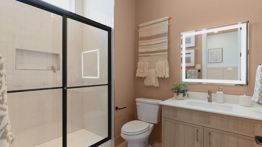 Representative furnished interior of a home built from the Silas by Chesmar Homes in Crescent Bluff, Georgetown (Image 9).