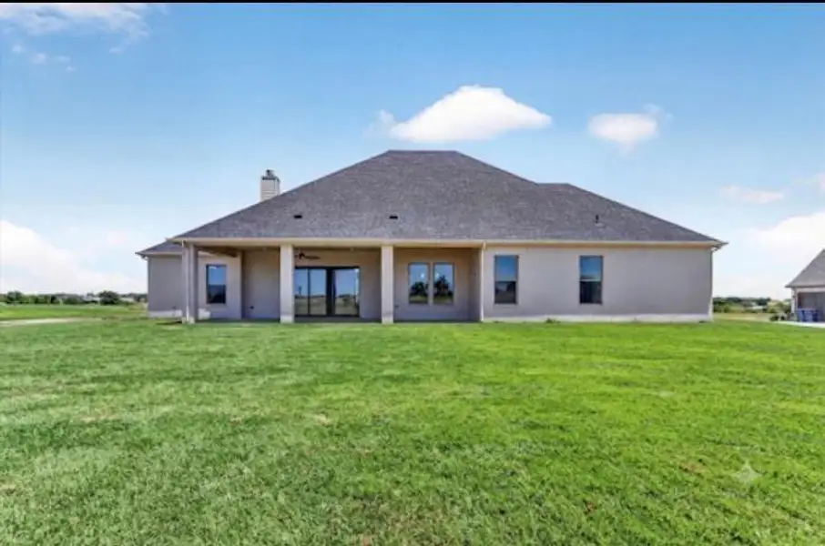 Exterior details and patio area of a home in , Godley (Image 3).
