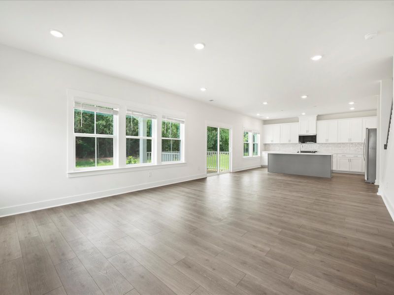 Spacious, unfurnished interior of a new home in The Coves at Lakes of Cane Bay, Summerville (Image 22).
