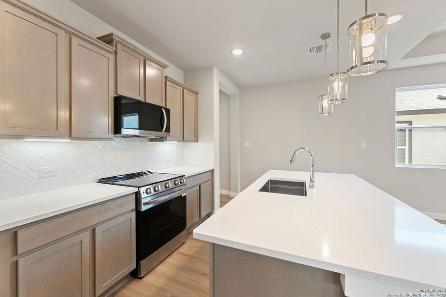 Furnished interior view inside a new home in Highland Ridge, New Braunfels (Image 6).
