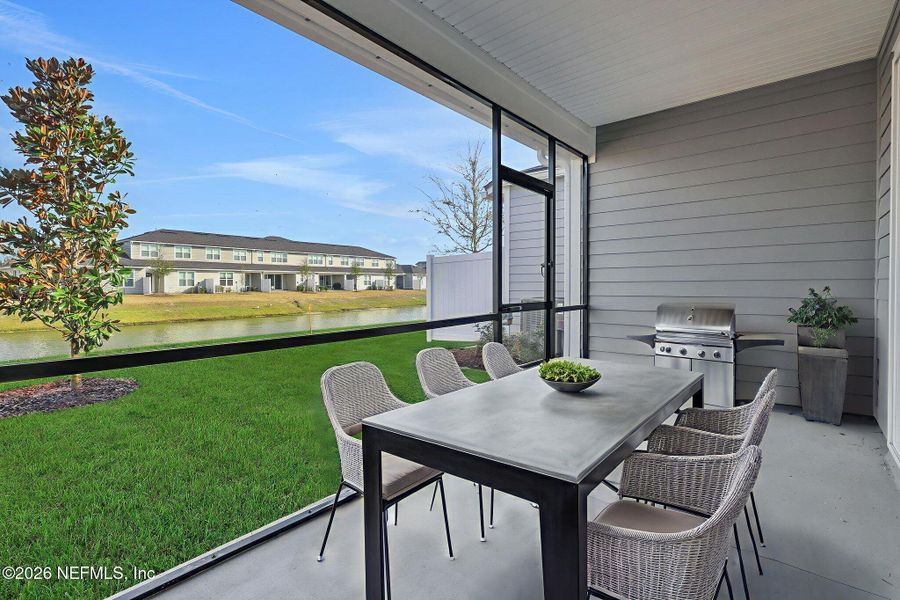 Exterior details and patio area of a home in Cherry Elm at SilverLeaf, St. Augustine (Image 27).