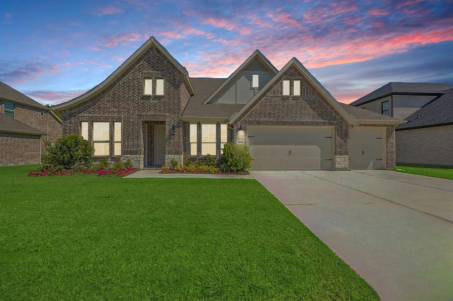 Front exterior of a new home in Lincoln Pointe, Van Alstyne, TX, highlighting curb appeal (Image 1). Front exterior of a new home in Lincoln Pointe, Van Alstyne, TX, highlighting curb appeal (Image 1).