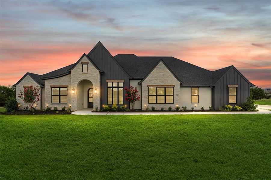 Front exterior of a home in the Rolling Creek Ranch community, located in Granbury, TX (Image 1). Front exterior of a home in the Rolling Creek Ranch community, located in Granbury, TX (Image 1).