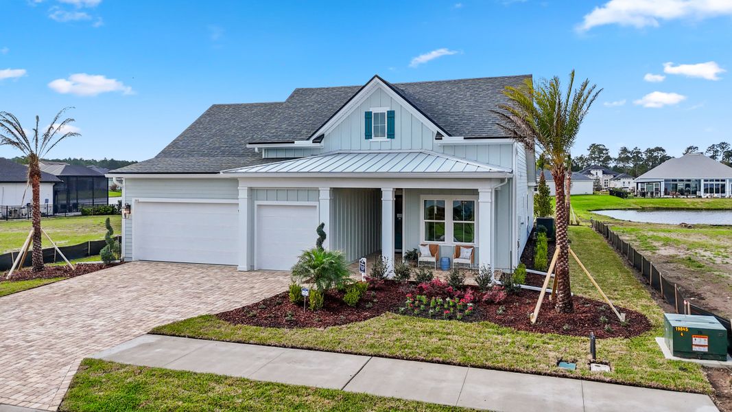 Front exterior of a new home in Amelia National Country Club, Fernandina Beach, FL, highlighting curb appeal (Image 23).