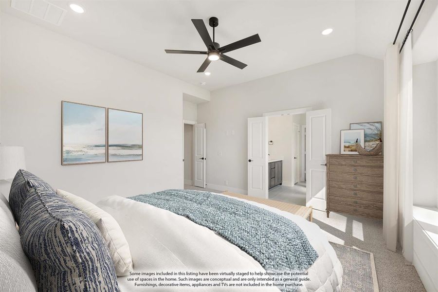 Bedroom with ceiling fan, carpet flooring, and open doors leading to ensuite bathroom and closet