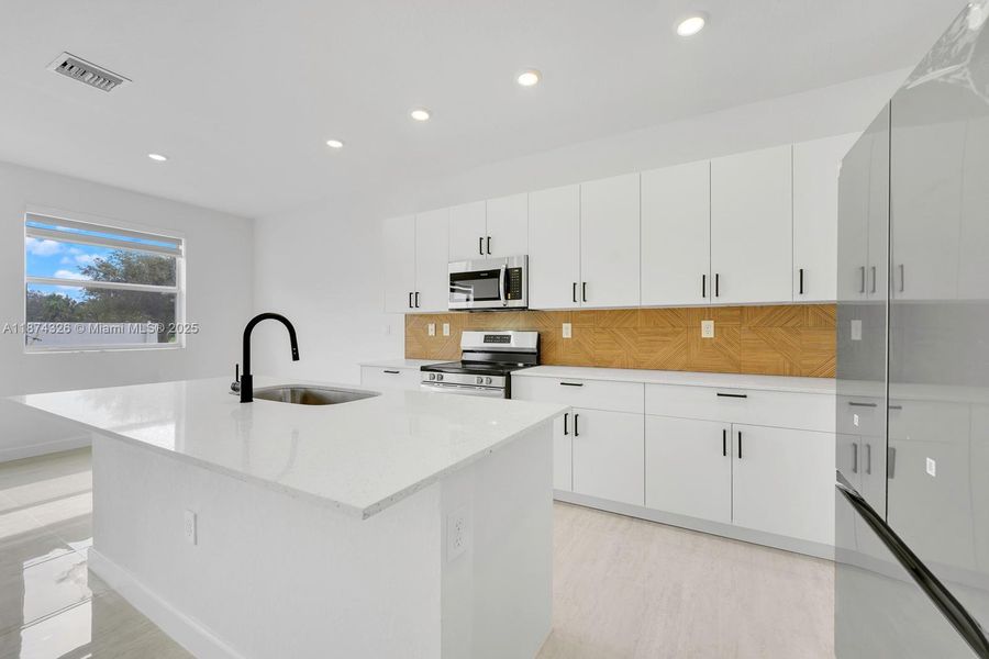 Furnished interior view inside a new home in , Miami (Image 5). Furnished interior view inside a new home in , Miami (Image 5).