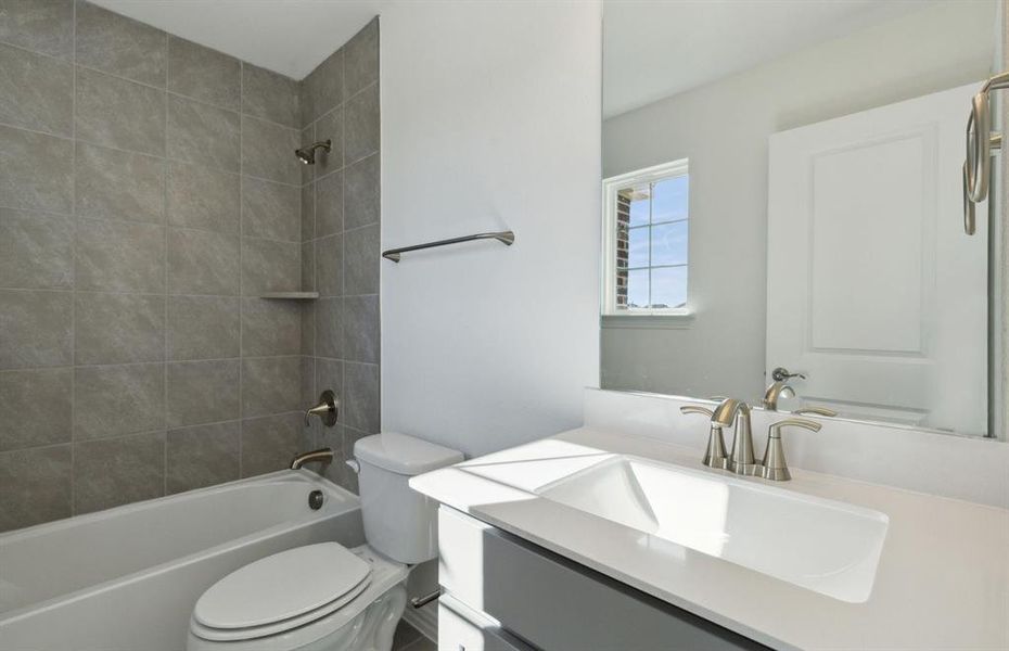 Upgraded secondary bathroom*real home pictured