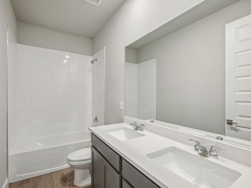 Bathroom in the Onyx floorplan at 6406 NW Sweetwood Drive