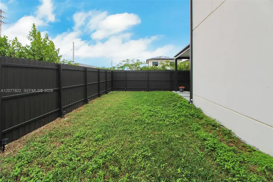 Exterior details and patio area of a home in , Florida City (Image 30).