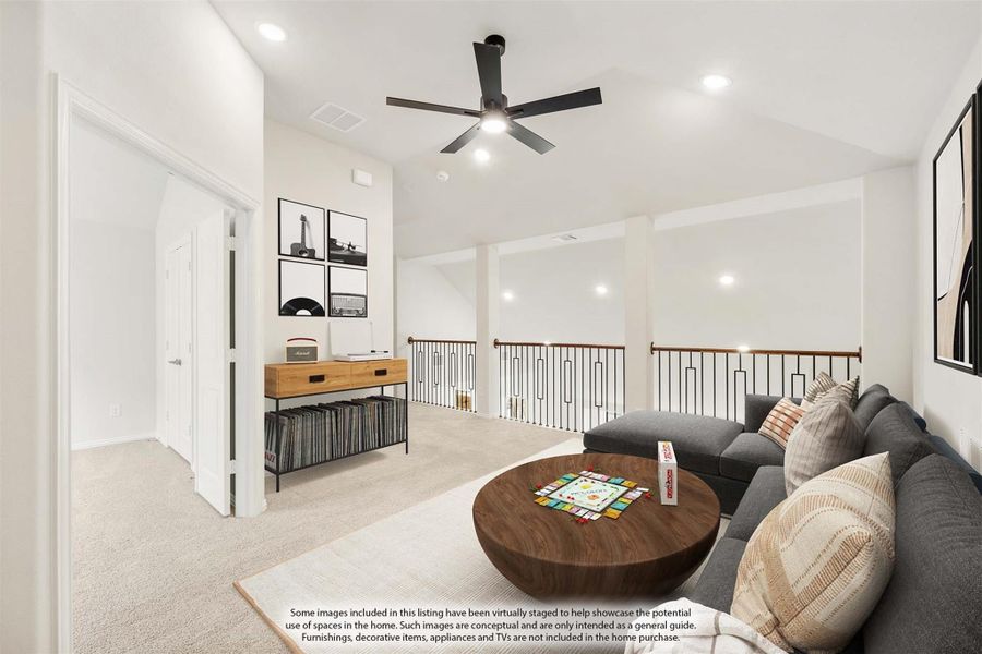 Upstairs loft with gray sectional sofa, ceiling fan, open railing, and carpet flooring