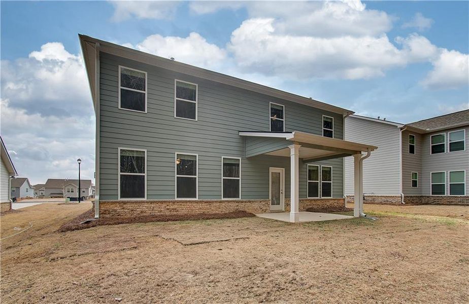 Exterior details and patio area of a home in Cooper Park, McDonough (Image 3).