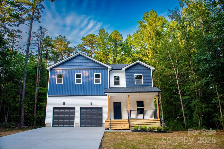 Front exterior of a new home in , Charlotte, NC, highlighting curb appeal (Image 21). Front exterior of a new home in , Charlotte, NC, highlighting curb appeal (Image 21).