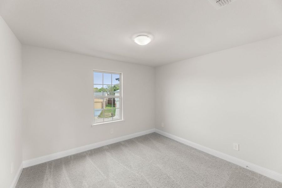 Front exterior of a new home in Main Street Village, Mansfield, TX, highlighting curb appeal (Image 16). Front exterior of a new home in Main Street Village, Mansfield, TX, highlighting curb appeal (Image 16).