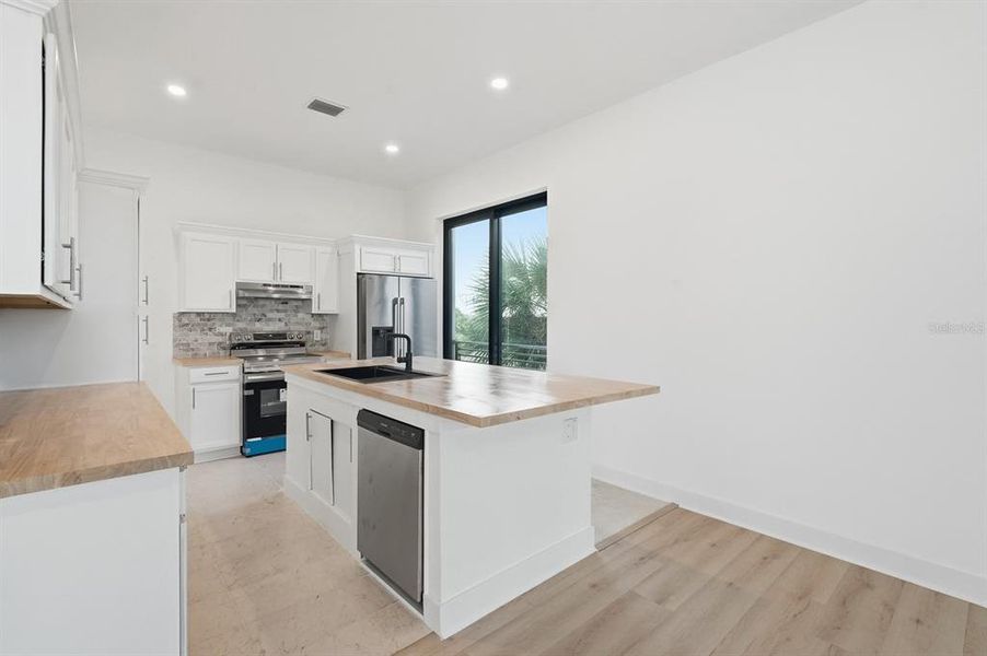 Furnished interior view inside a new home in , Flagler Beach (Image 14).