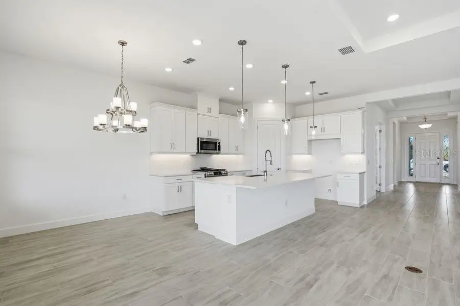 Furnished interior view inside a new home in Esplanade at Coasterra, Palmetto (Image 6).