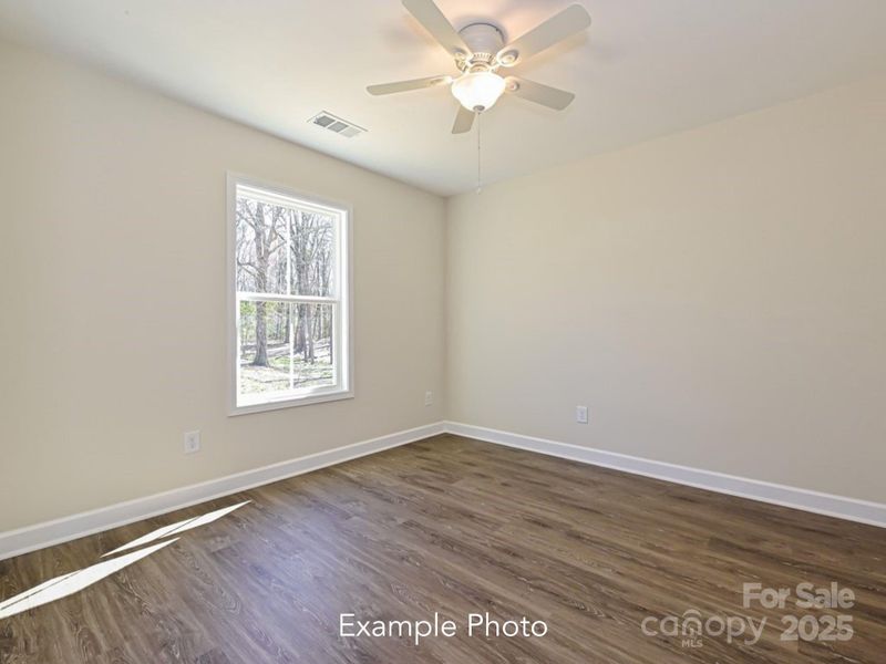 Example Photo Example Photo