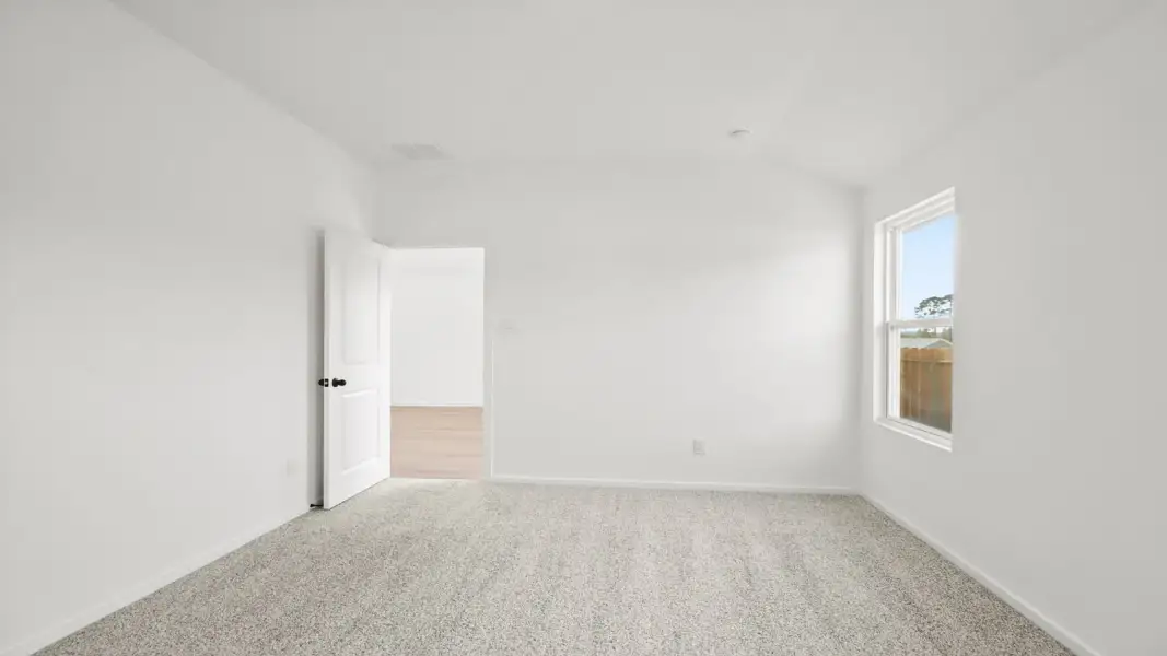 Spacious, unfurnished interior of a new home in The Canopies, Splendora (Image 11).