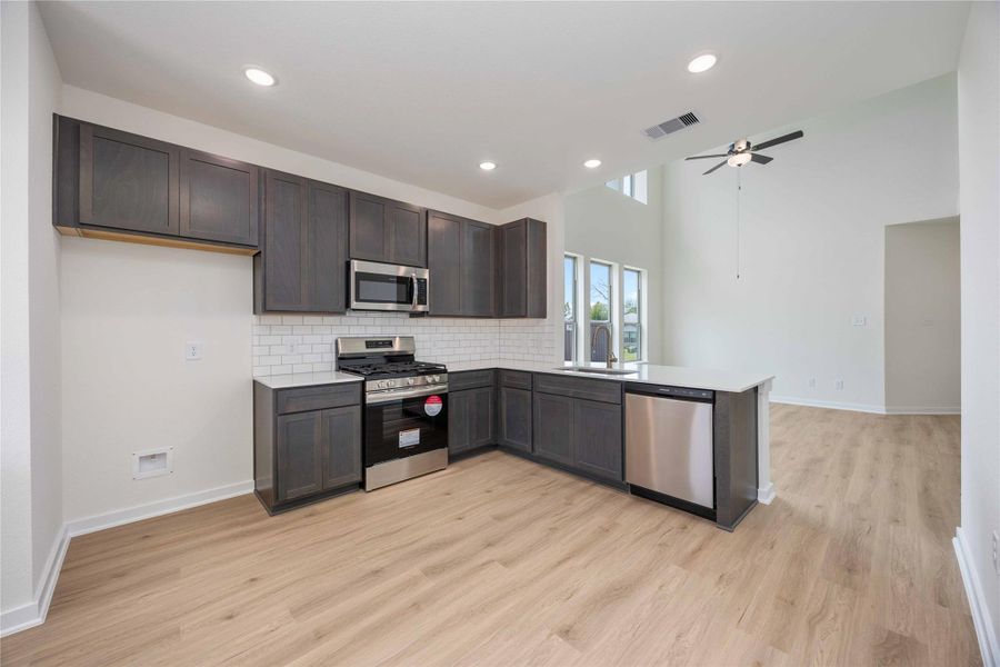 Furnished interior view inside a new home in Lexington Heights, Willis (Image 11).