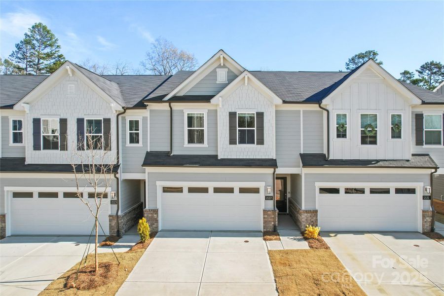 Front exterior of a new home in Galloway Towns, Charlotte, NC, highlighting curb appeal (Image 19). Front exterior of a new home in Galloway Towns, Charlotte, NC, highlighting curb appeal (Image 19).
